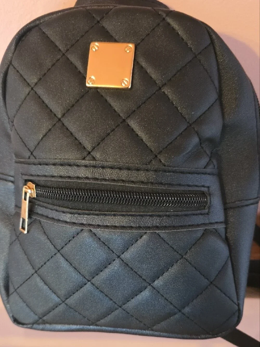 Quilted Black Mini Backpack with Gold Accent